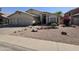 Charming home featuring a low maintenance desert landscape and a three car garage at 2629 E Verbena Dr, Phoenix, AZ 85048