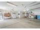 Garage view featuring built-in shelving and organized storage solutions at 2629 E Verbena Dr, Phoenix, AZ 85048