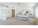 Bright bedroom with a comfy bed, stylish decor, and natural light at 2629 E Verbena Dr, Phoenix, AZ 85048