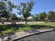 Community playground offers a safe and fun environment for with picnic tables and shade at 2629 E Verbena Dr, Phoenix, AZ 85048