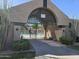 Community pool entrance showing a gated pool with lush landscaping at 2629 E Verbena Dr, Phoenix, AZ 85048