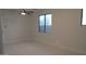This bedroom offers lots of natural light and neutral decor at 29462 N 126Th Ln, Peoria, AZ 85383