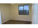 Well-lit bedroom with a new ceiling fan, modern vinyl floors, and a neutral color palette at 29462 N 126Th Ln, Peoria, AZ 85383
