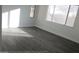 This bedroom offers lots of natural light and wood flooring at 29462 N 126Th Ln, Peoria, AZ 85383