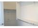 Walk-in closet with built-in shelving and ample storage space at 29462 N 126Th Ln, Peoria, AZ 85383