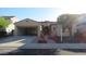 Charming one-story home with desert landscaping, covered entry, and an attached two-car garage at 29462 N 126Th Ln, Peoria, AZ 85383