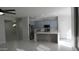 Bright kitchen boasts stainless steel appliances, stylish island, and updated cabinets, perfect for modern living at 29462 N 126Th Ln, Peoria, AZ 85383