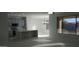 Modern kitchen boasts stainless appliances, quartz countertops, and ample natural light at 29462 N 126Th Ln, Peoria, AZ 85383