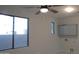 Well-lit laundry area offering large window, storage cabinets, and utility connections at 29462 N 126Th Ln, Peoria, AZ 85383
