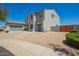 A charming two-story home with a three-car garage and desert landscaping at 32525 N 41St Way, Cave Creek, AZ 85331