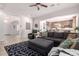 The living room opens to the kitchen and features an inviting space with tile floors and comfortable furnishings at 32525 N 41St Way, Cave Creek, AZ 85331