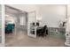 A nicely decorated home office, with doorway leading to the formal dining room at 32525 N 41St Way, Cave Creek, AZ 85331