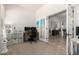 A nicely decorated home office, with doorway leading to the formal dining room at 32525 N 41St Way, Cave Creek, AZ 85331