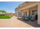 Charming patio with comfortable seating, perfect for enjoying the serene backyard view at 32525 N 41St Way, Cave Creek, AZ 85331