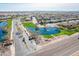Panoramic aerial perspective highlighting ponds, walkways, and green spaces enhancing community appeal at 38082 W Santa Barbara Ave, Maricopa, AZ 85138