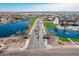 Aerial view displaying the community's serene ponds and walking paths connecting neighborhoods at 38082 W Santa Barbara Ave, Maricopa, AZ 85138