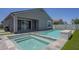 Backyard pool, spa, and patio area offer a private outdoor oasis at 38082 W Santa Barbara Ave, Maricopa, AZ 85138