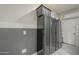 Garage offers ample storage with floor to ceiling shelving and cabinets at 38082 W Santa Barbara Ave, Maricopa, AZ 85138