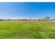 Expansive green space offers plenty of room for outdoor activities and recreation in this community at 38082 W Santa Barbara Ave, Maricopa, AZ 85138