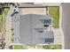 An aerial shot of a home with a dark roof, solar panels, and low-maintenance landscaping at 3834 E Clarendon Ave, Phoenix, AZ 85018