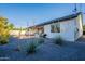 Backyard featuring patio and barbecue, accented by desert landscaping at 3834 E Clarendon Ave, Phoenix, AZ 85018