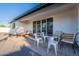 Outdoor patio with comfortable seating and a view of the bright backyard at 3834 E Clarendon Ave, Phoenix, AZ 85018