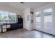 Large bedroom with a view of the backyard and a dark storage unit and musical keyboard at 3834 E Clarendon Ave, Phoenix, AZ 85018