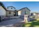Attractive home exterior featuring brick accents, manicured landscaping, and a welcoming entrance at 3834 E Clarendon Ave, Phoenix, AZ 85018