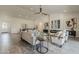 Inviting living area with a fireplace, modern art, and comfortable seating for relaxation and gatherings at 3834 E Clarendon Ave, Phoenix, AZ 85018