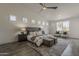 This spacious bedroom has a vaulted ceiling, multiple windows, and a seating area at 3834 E Clarendon Ave, Phoenix, AZ 85018