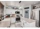 Bright kitchen featuring stainless steel appliances, countertops and island, and natural light at 4117 E Baylor Ln, Gilbert, AZ 85296