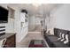 Upstairs den featuring carpet, large couch, shelving, and neutral paint scheme at 4117 E Baylor Ln, Gilbert, AZ 85296