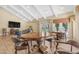 Spacious clubhouse featuring beamed ceilings, TV, and seating for gatherings and community events at 4200 N Miller Rd # 112, Scottsdale, AZ 85251