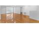 Bright living room with light wood floors and lots of natural light from the large windows at 4200 N Miller Rd # 112, Scottsdale, AZ 85251