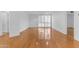 Bright, open living space with hardwood floors, large windows, and modern fixtures at 4200 N Miller Rd # 112, Scottsdale, AZ 85251