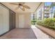 Outdoor patio with ceiling fan and garden view perfect for relaxation at 4200 N Miller Rd # 112, Scottsdale, AZ 85251