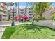 Well-maintained putting green area perfect for practicing your short game amidst picturesque landscaping at 4200 N Miller Rd # 112, Scottsdale, AZ 85251