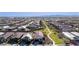 A high aerial view of a new home construction with a park adjacent to it at 4352 N 91St Gln, Phoenix, AZ 85037