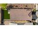 Aerial view of a home with a tile roof and artificial grass back yard at 4352 N 91St Gln, Phoenix, AZ 85037