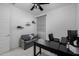 Relaxing bedroom with a sofa, desk, and a ceiling fan at 4352 N 91St Gln, Phoenix, AZ 85037