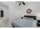 Cozy bedroom featuring neutral colors, ceiling fan, and a closet at 4352 N 91St Gln, Phoenix, AZ 85037