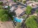 Aerial view of backyard featuring the pool, outdoor patio area, and landscaping at 4466 S Brice --, Mesa, AZ 85212