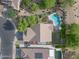 Aerial view of home showcasing swimming pool, desert landscaping, and spacious backyard at 4466 S Brice --, Mesa, AZ 85212
