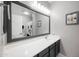 Bathroom featuring a vanity, large mirror, and great lighting offering a great at home experience at 4466 S Brice --, Mesa, AZ 85212