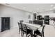 Cozy dining area with contemporary table and chairs adjacent to the kitchen, perfect for Gathering meals at 4466 S Brice --, Mesa, AZ 85212