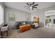 Inviting living room featuring neutral paint, carpet, a ceiling fan, and a comfortable sectional sofa at 4466 S Brice --, Mesa, AZ 85212