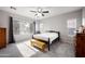 Inviting main bedroom with abundant natural light, cozy carpet, and serene ambiance for relaxation at 4466 S Brice --, Mesa, AZ 85212