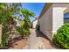 Landscaped side yard with walkway at 4738 N Greenview W Cir, Litchfield Park, AZ 85340