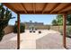 Spacious backyard showcasing lounge chairs and desert landscaping, perfect for enjoying the outdoors at 4765 E Charleston Ave, Phoenix, AZ 85032