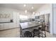 Modern kitchen with stainless steel appliances, granite countertops and breakfast bar at 4765 E Charleston Ave, Phoenix, AZ 85032